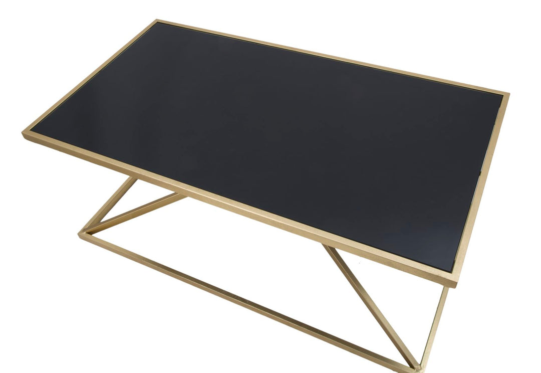 Mesa de centro de metal dorado y negro con patas piramidales