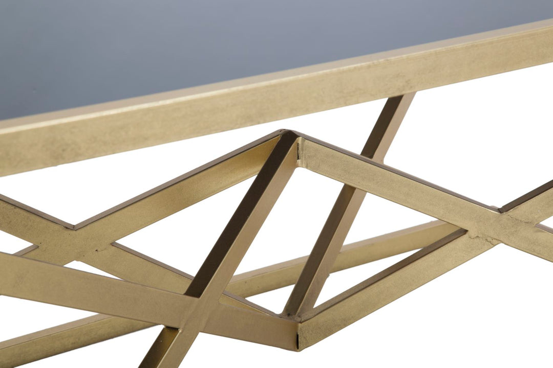 Mesa de centro de metal dorado y negro con patas piramidales