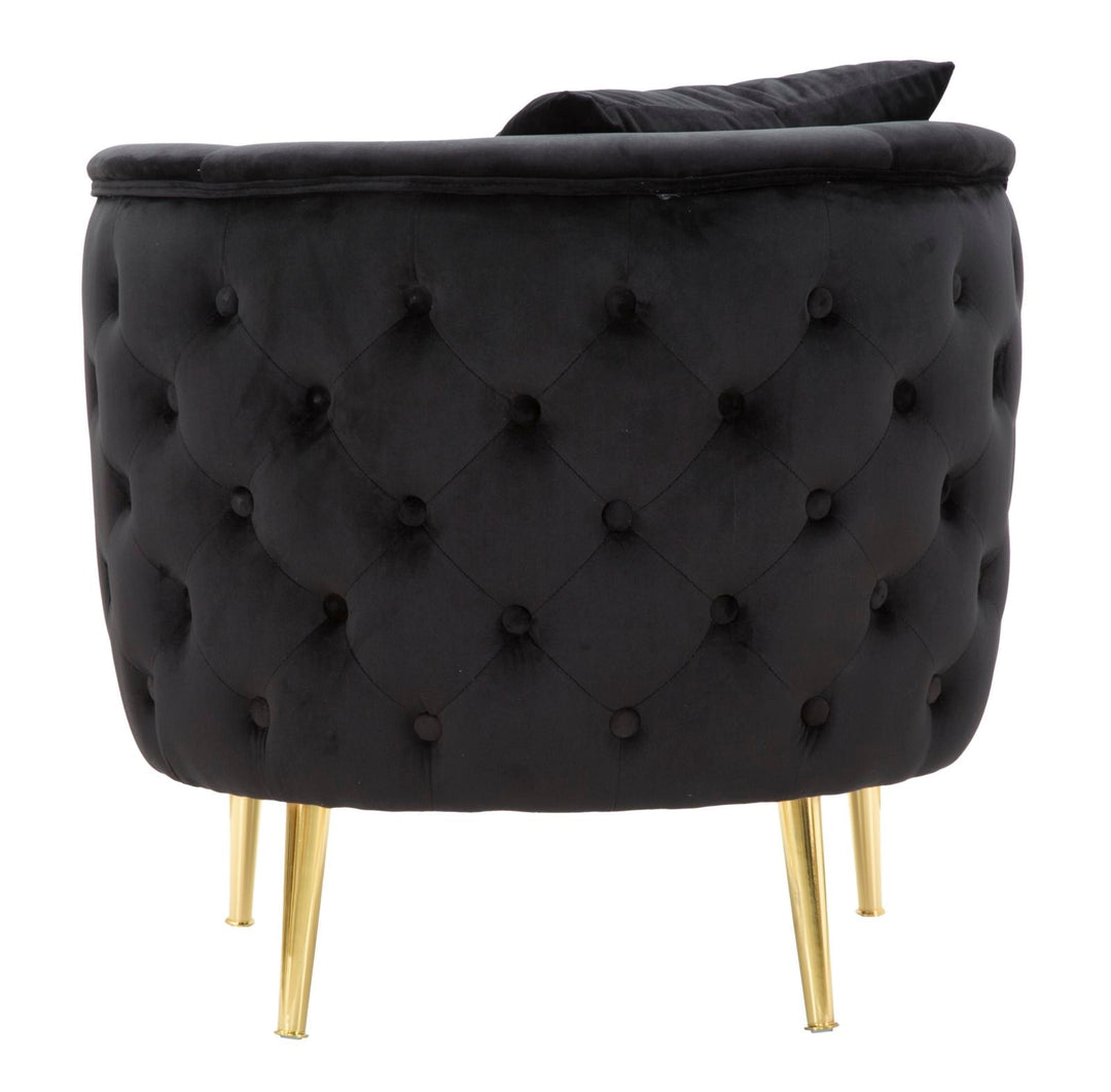 Sillón de terciopelo negro con patas de metal dorado