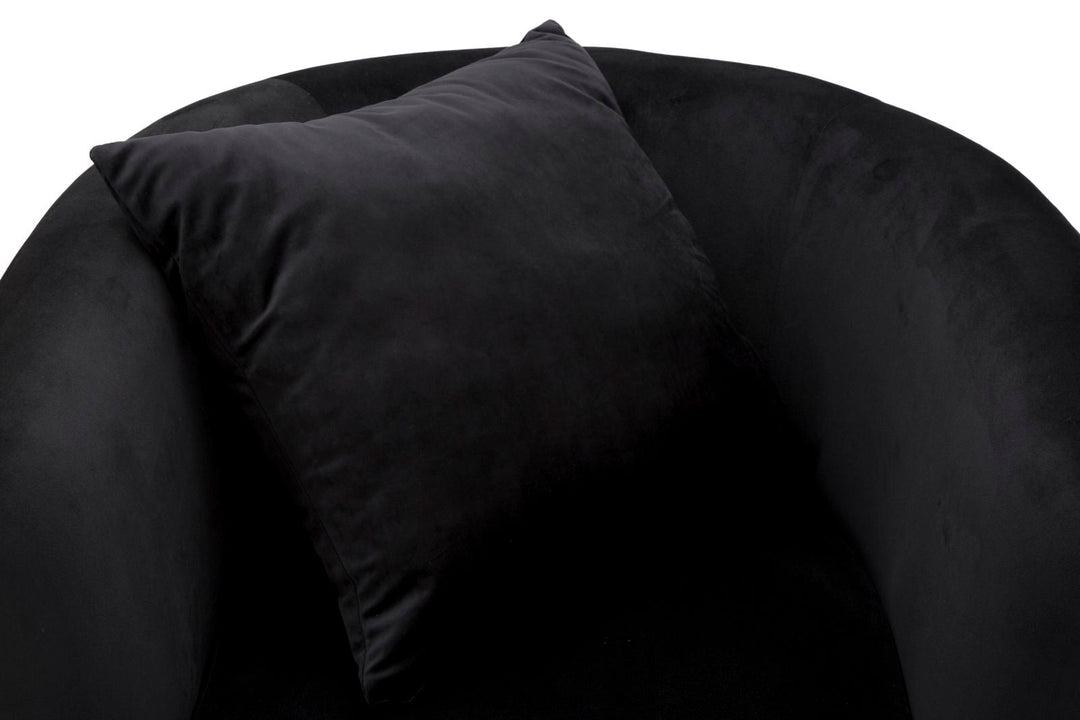 Sillón de terciopelo negro con patas de metal dorado