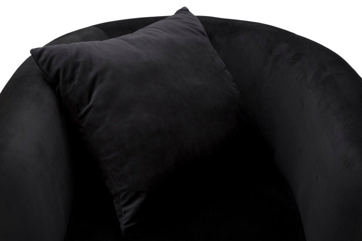 Sillón de terciopelo negro con patas de metal dorado