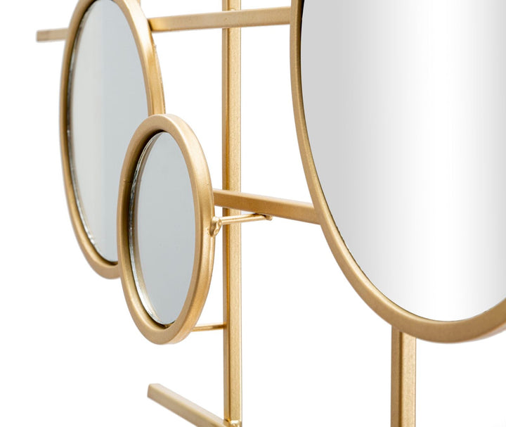Pequeños espejos de pared redondos de metal dorado
