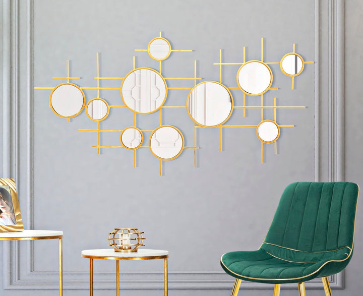 Pequeños espejos de pared redondos de metal dorado