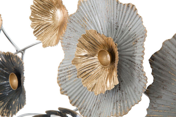 Decoración de pared con hojas y flores de metal