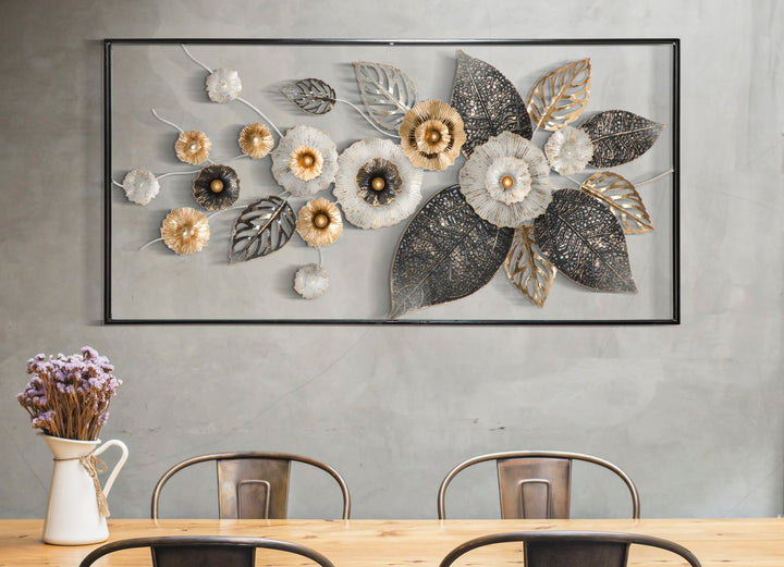 Decoración de pared con hojas y flores de metal