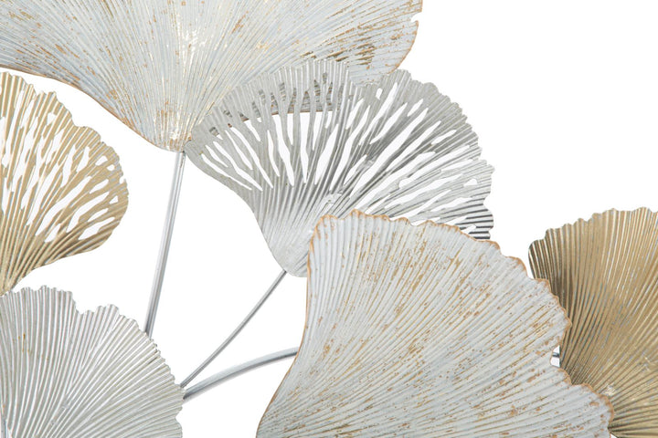 Decoración de pared de hojas doradas y blancas