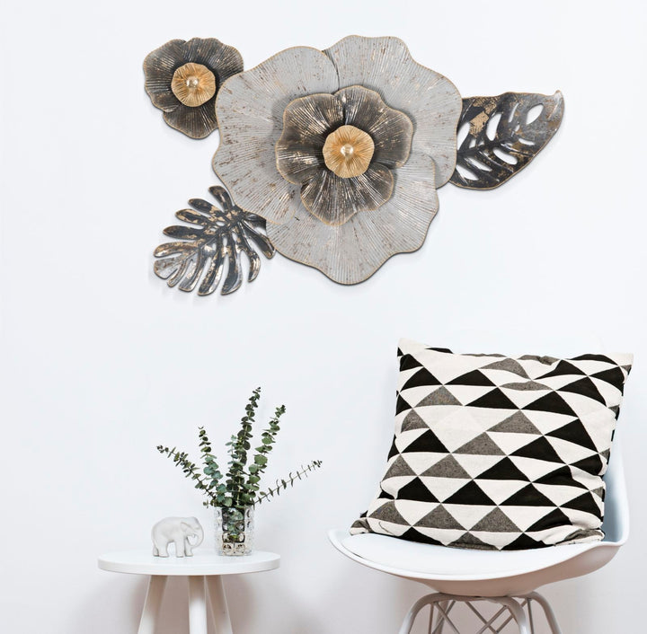 Decoración de pared de flores y hojas de metal