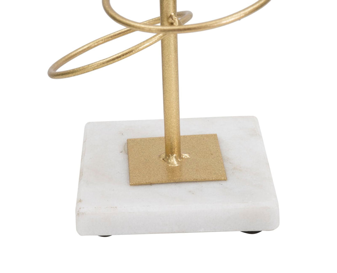 Portavelas de Metal Dorado en Forma de Anillo sobre Base de Mármol Blanco
