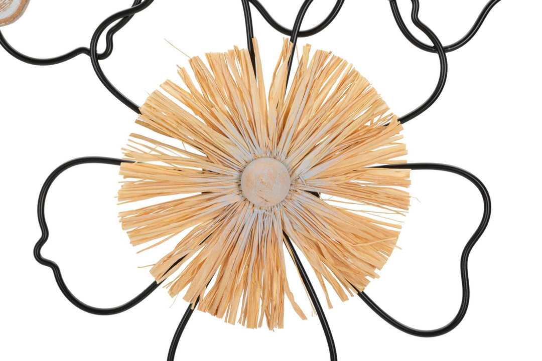 Decoración de pared de metal y madera con flores