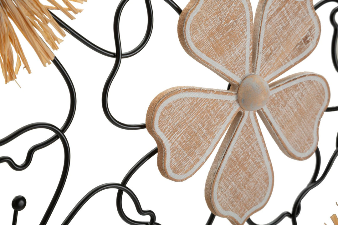 Decoración de pared de metal y madera con flores