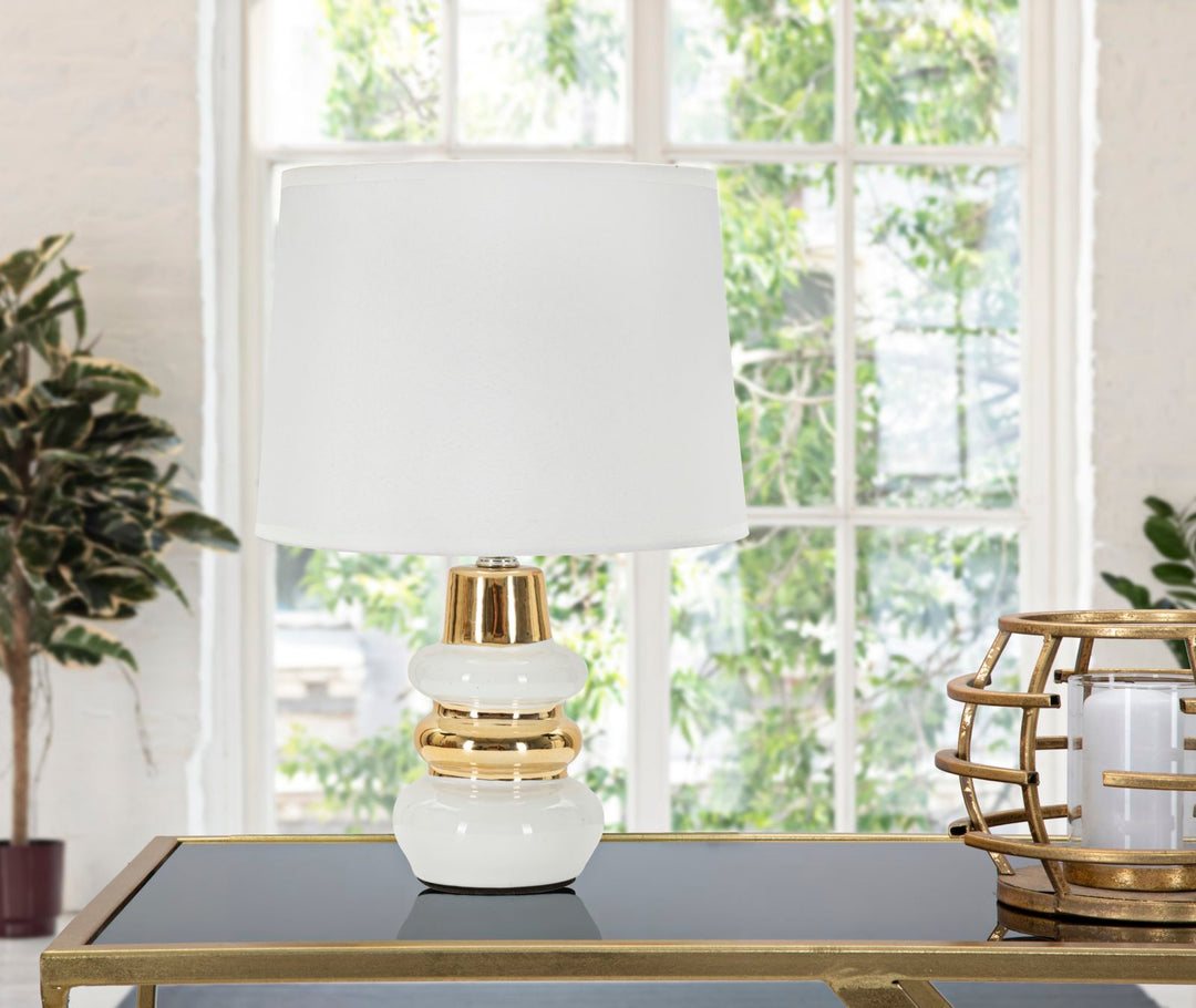 Lámpara de mesa blanca y dorada con pantalla de tela – Liara Collection