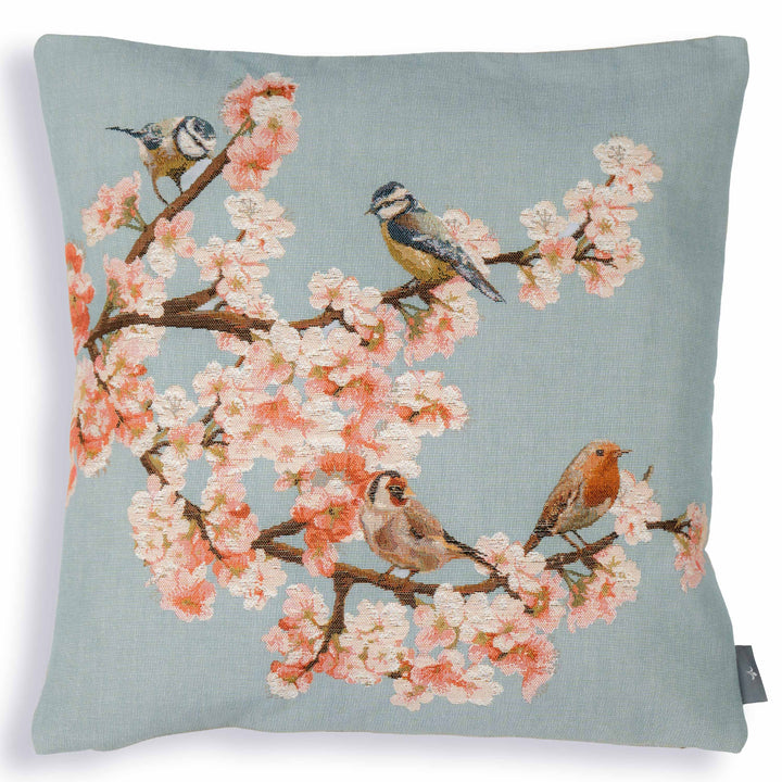 Cojín azul – pájaros y flores de cerezo (tejido jacquard)
