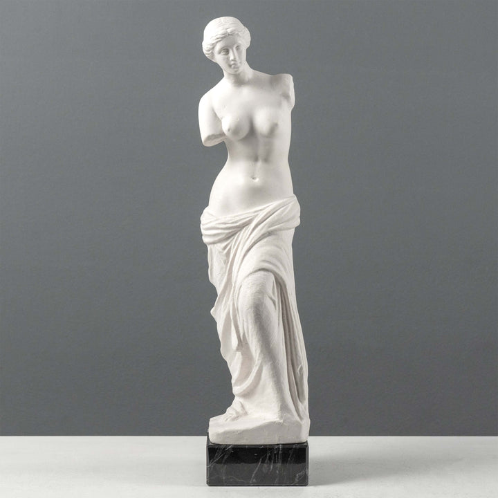 Busto de Venus de Milo con base de mármol negro