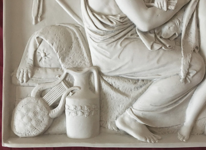 Cúpido recibido por Anacreón (bajorrelieve)