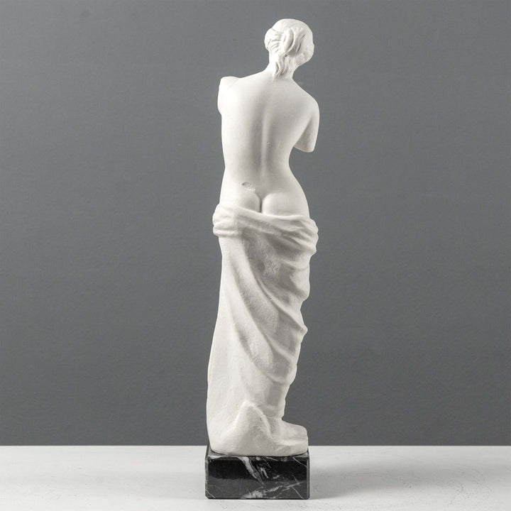 Busto de Venus de Milo con base de mármol negro