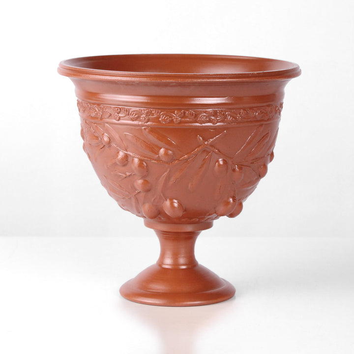 Copa de cerámica romana con relieve de olivos