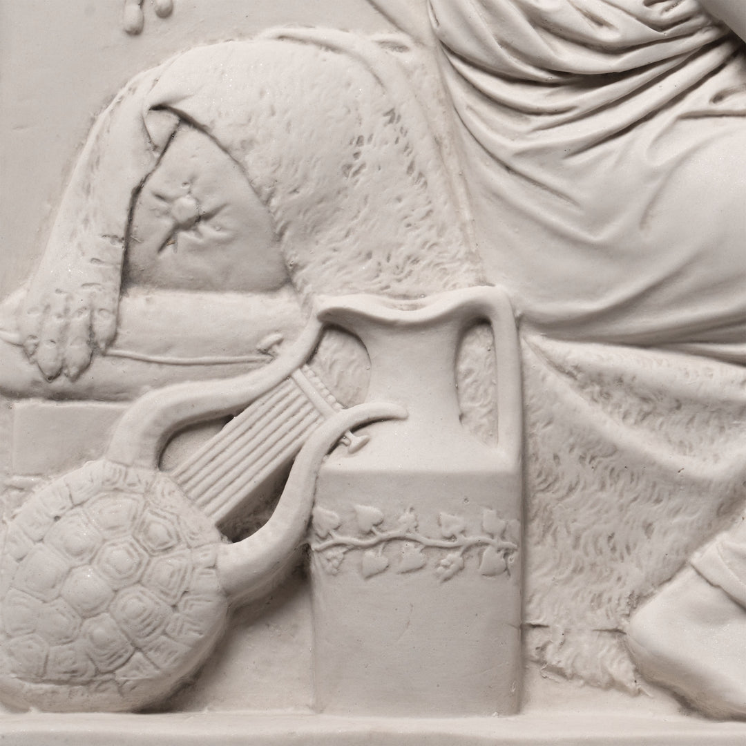 Cúpido recibido por Anacreón (bajorrelieve)