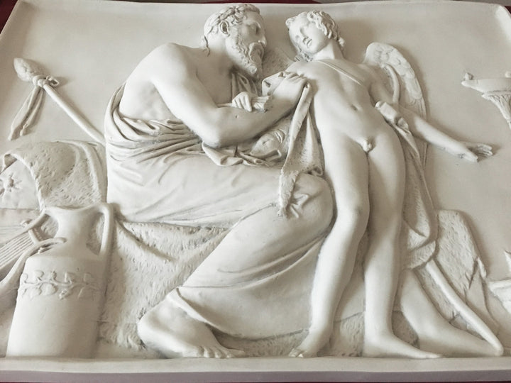 Cúpido recibido por Anacreón (bajorrelieve)