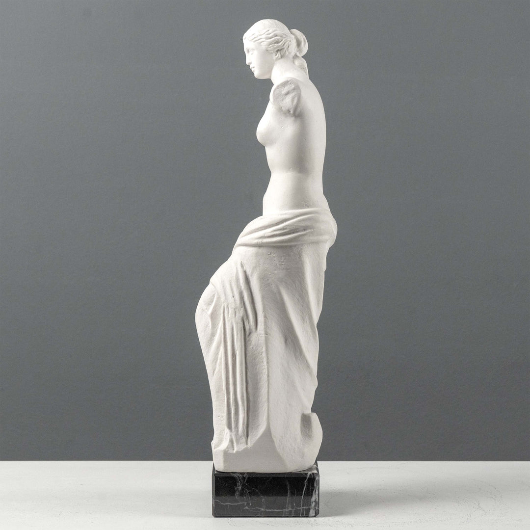 Busto de Venus de Milo con base de mármol negro