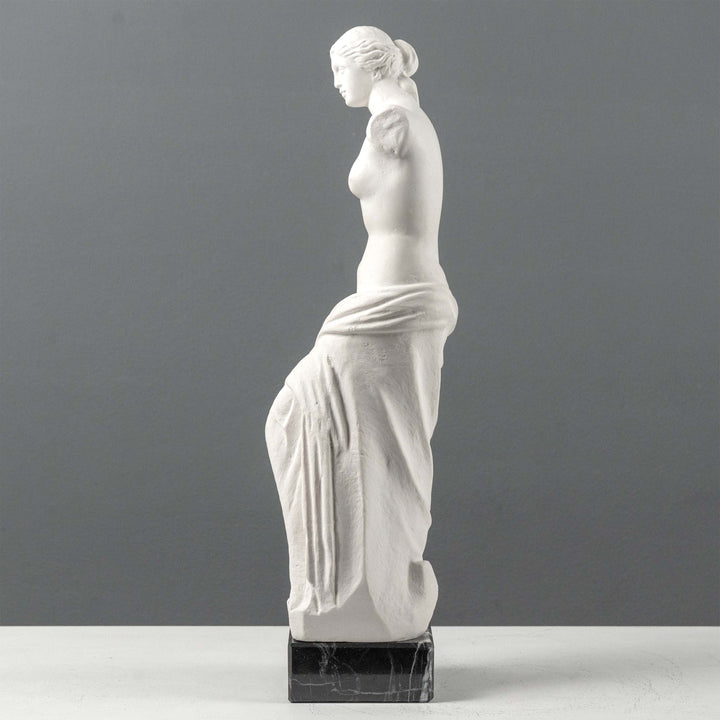 Busto de Venus de Milo con base de mármol negro