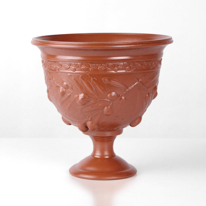 Copa de cerámica romana con relieve de olivos