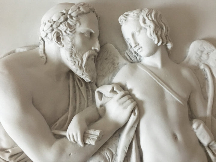 Cúpido recibido por Anacreón (bajorrelieve)