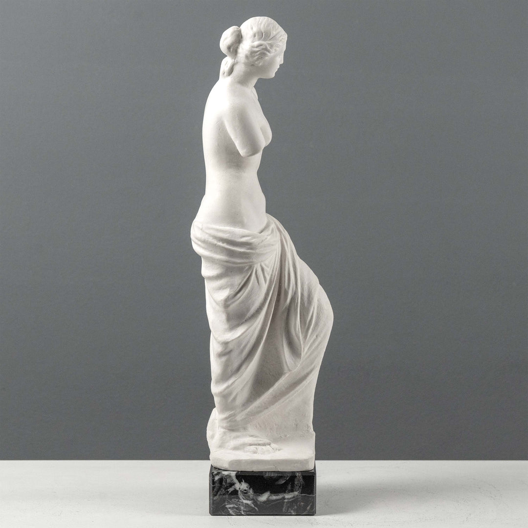 Busto de Venus de Milo con base de mármol negro