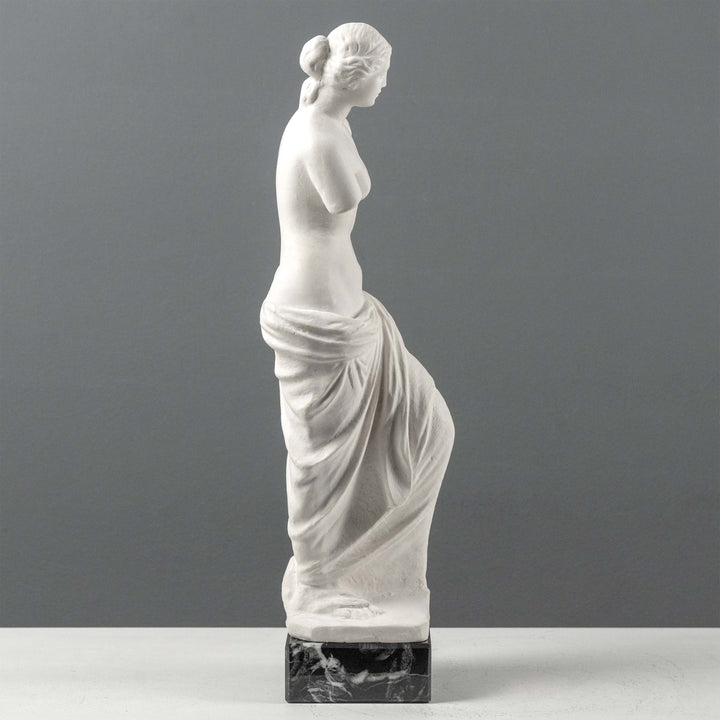 Busto de Venus de Milo con base de mármol negro