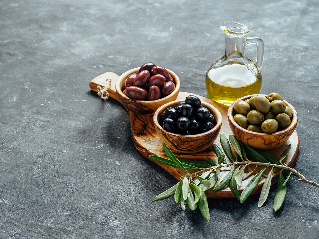 Juego de tablas de cortar con mango irregular de madera de olivo hecho a mano (2 piezas)