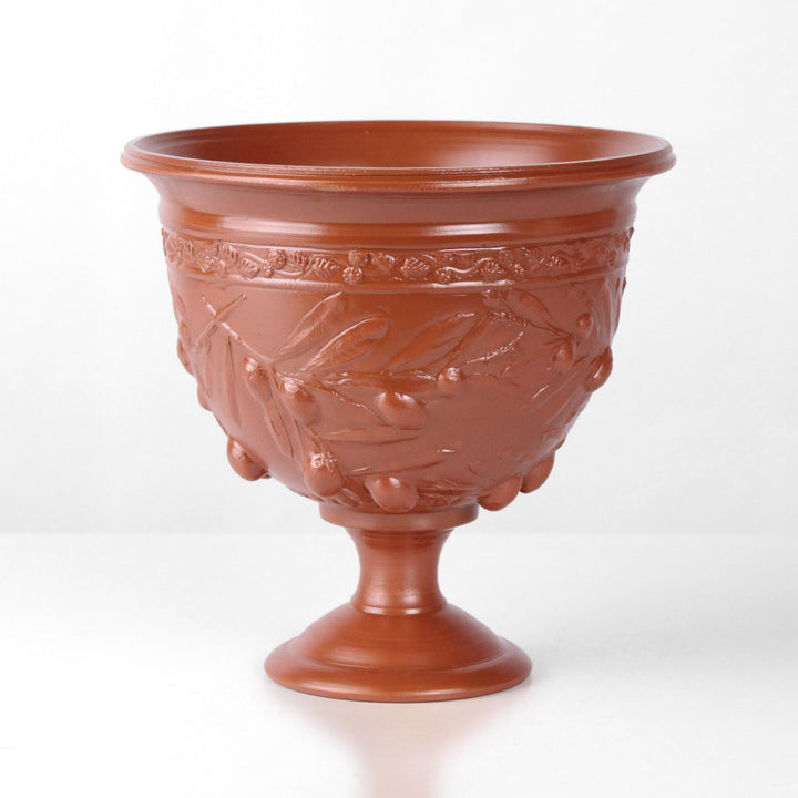 Copa de cerámica romana con relieve de olivos