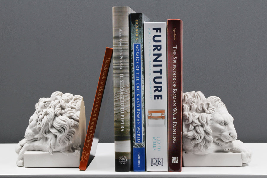 Par de sujetalibros de leones de Canova