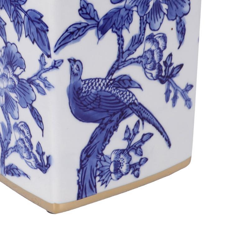 Tibor de porcelana floral azul y blanco con borde dorado
