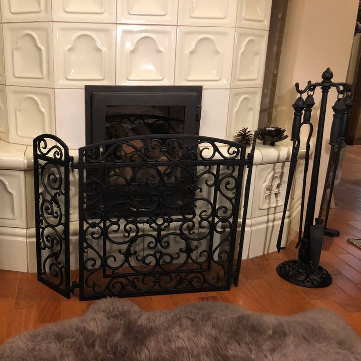 Juego de herramientas para chimenea en hierro fundido con remates de piña