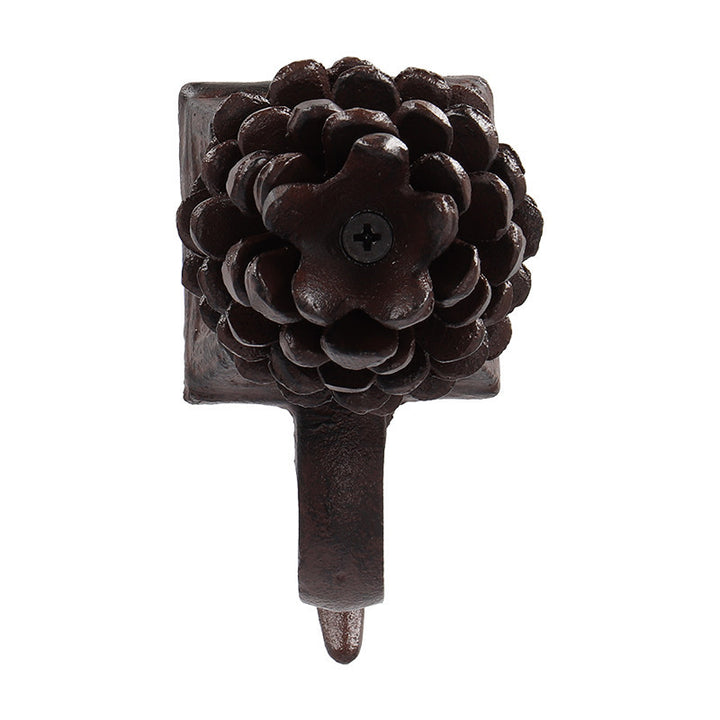 Soporte navideño para calcetines en hierro fundido con remate de piña