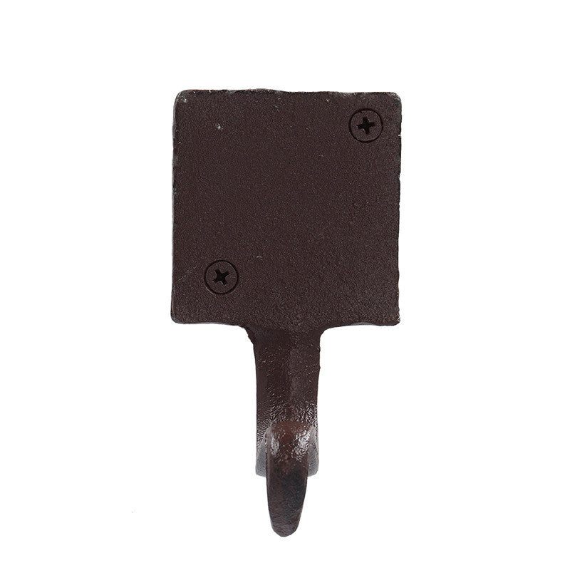 Soporte navideño para calcetines en hierro fundido con remate de piña