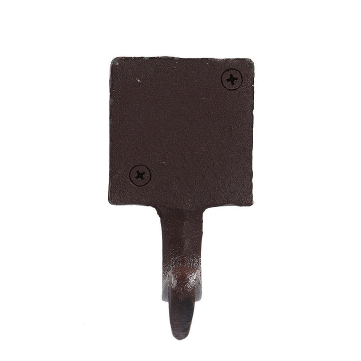 Soporte navideño para calcetines en hierro fundido con remate de piña