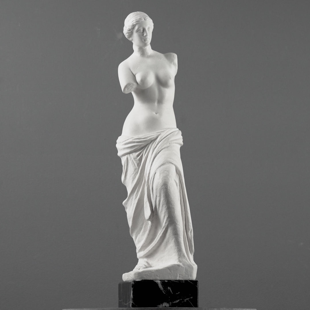 Busto de Venus de Milo con base de mármol negro