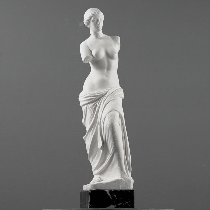 Busto de Venus de Milo con base de mármol negro